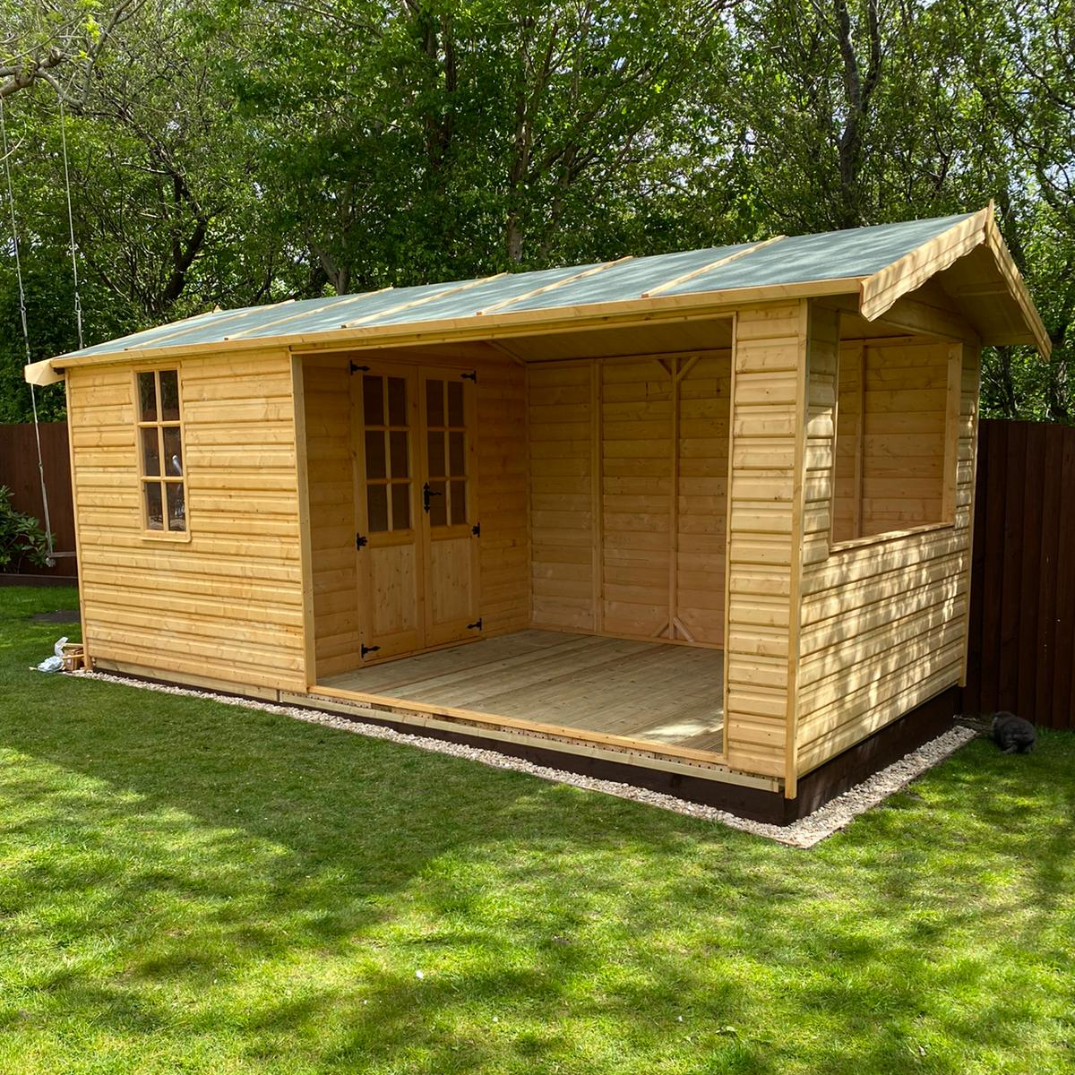 16' x 8' Apex Style Summerhouse with decking area. Painted Golden Brown.