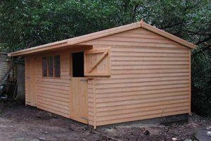 Workshop and stable combined with stable doors on the horse side.