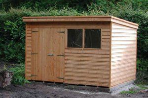 Large pent shed with double door on the left and double window on the right.