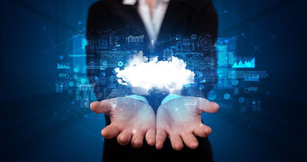 A Woman In A Suit Is Holding A Cloud In Her Hands — Black Label I.T. in Garbutt, QLD