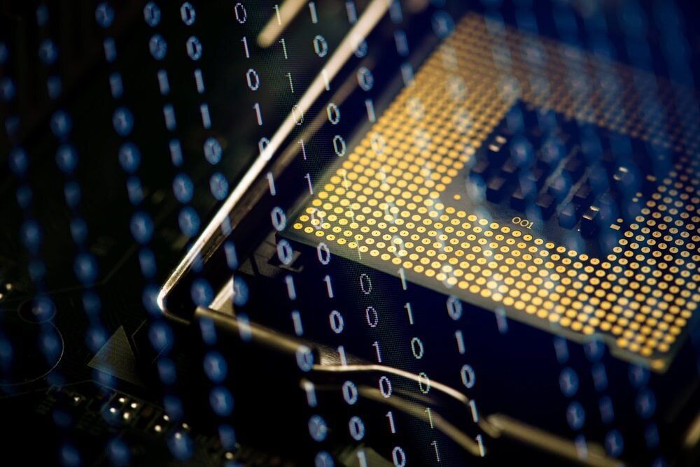 A Close Up Of A Computer Chip With Binary Code Behind It — Black Label I.T. in Garbutt, QLD