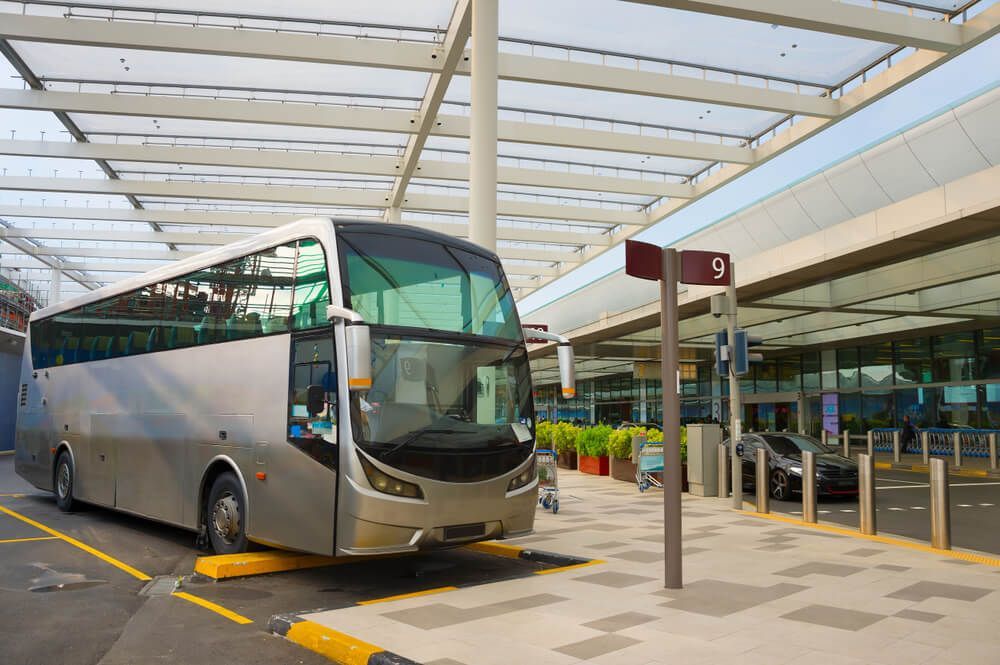 Bus On A Parking Lot — Local Bus Hire in Byron Bay, NSW