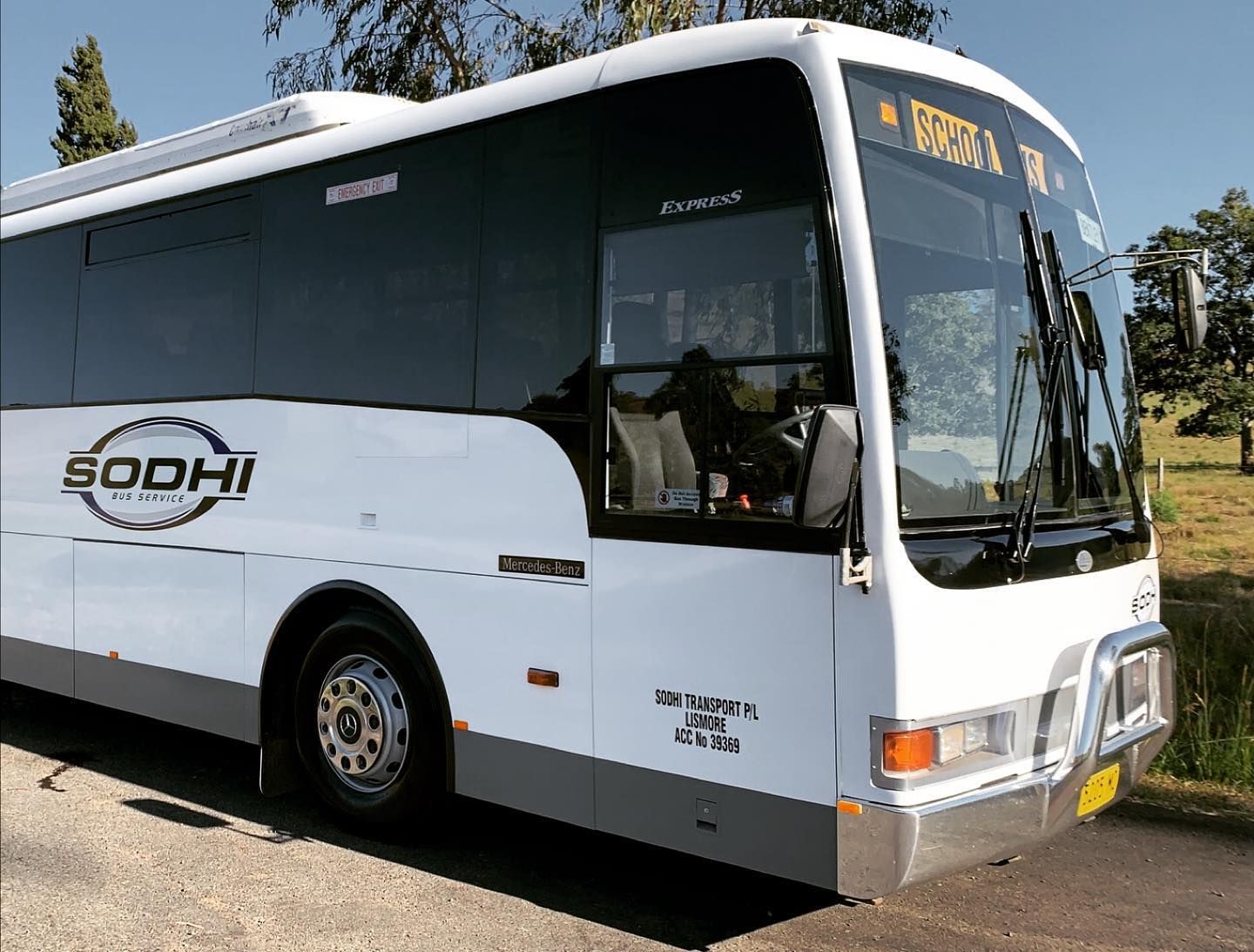 Parked Sodhi School Bus — Local Bus Hire in Lismore, NSW