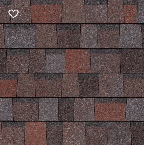 Close-up of asphalt roof shingles in shades of brown, red, and gray.