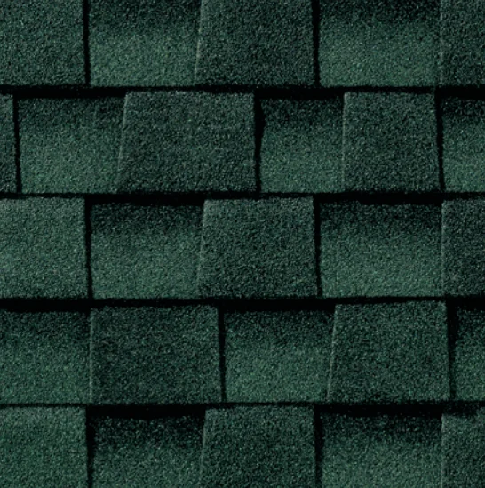 Green asphalt roof shingles.