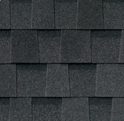 Dark gray asphalt roof shingles in a repeating pattern.