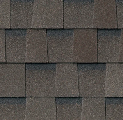 Dark brown asphalt roof shingles.