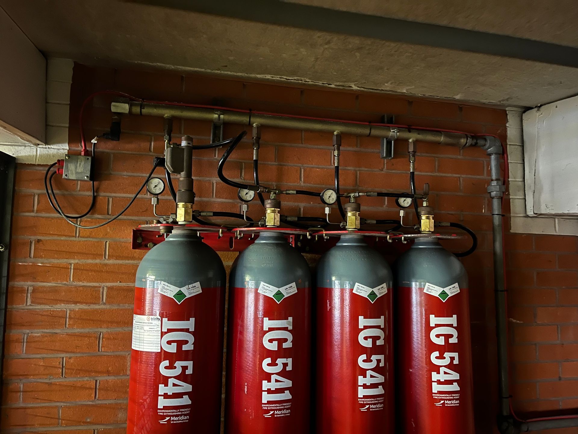 A row of red cylinders that say ig 540 on them