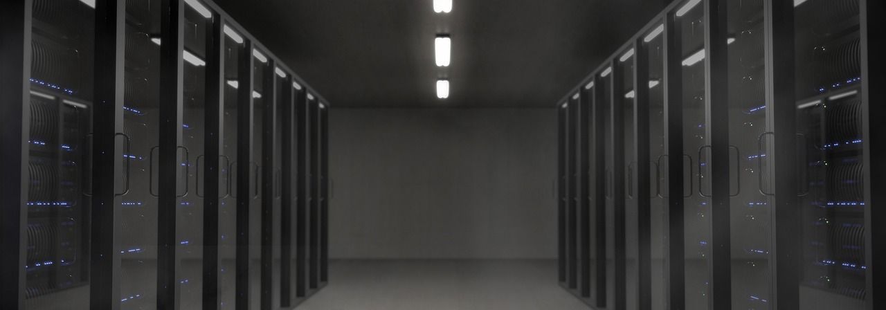 A row of servers in a server room in a data center.