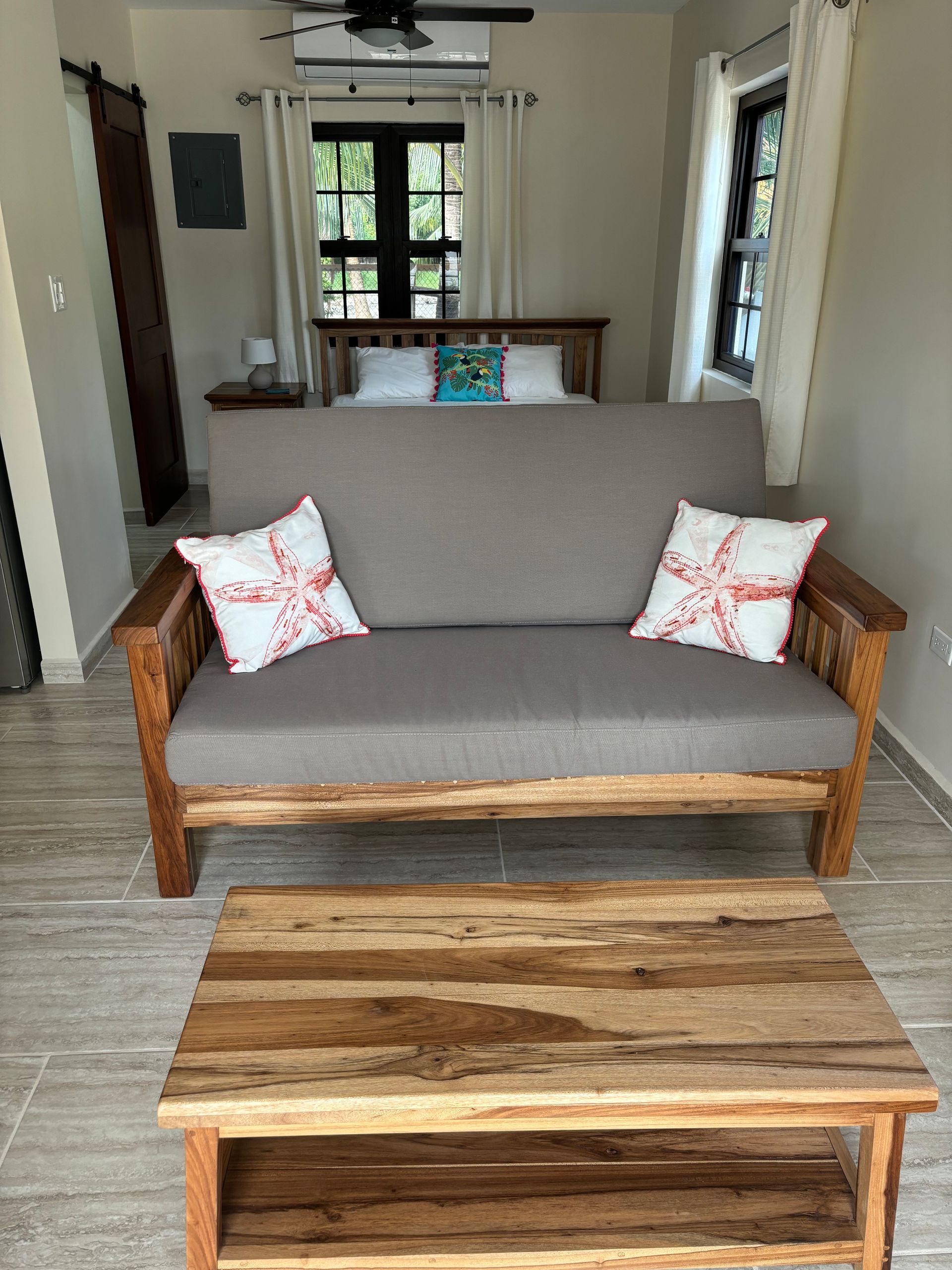 Toucan Suite living room with a couch and a coffee table