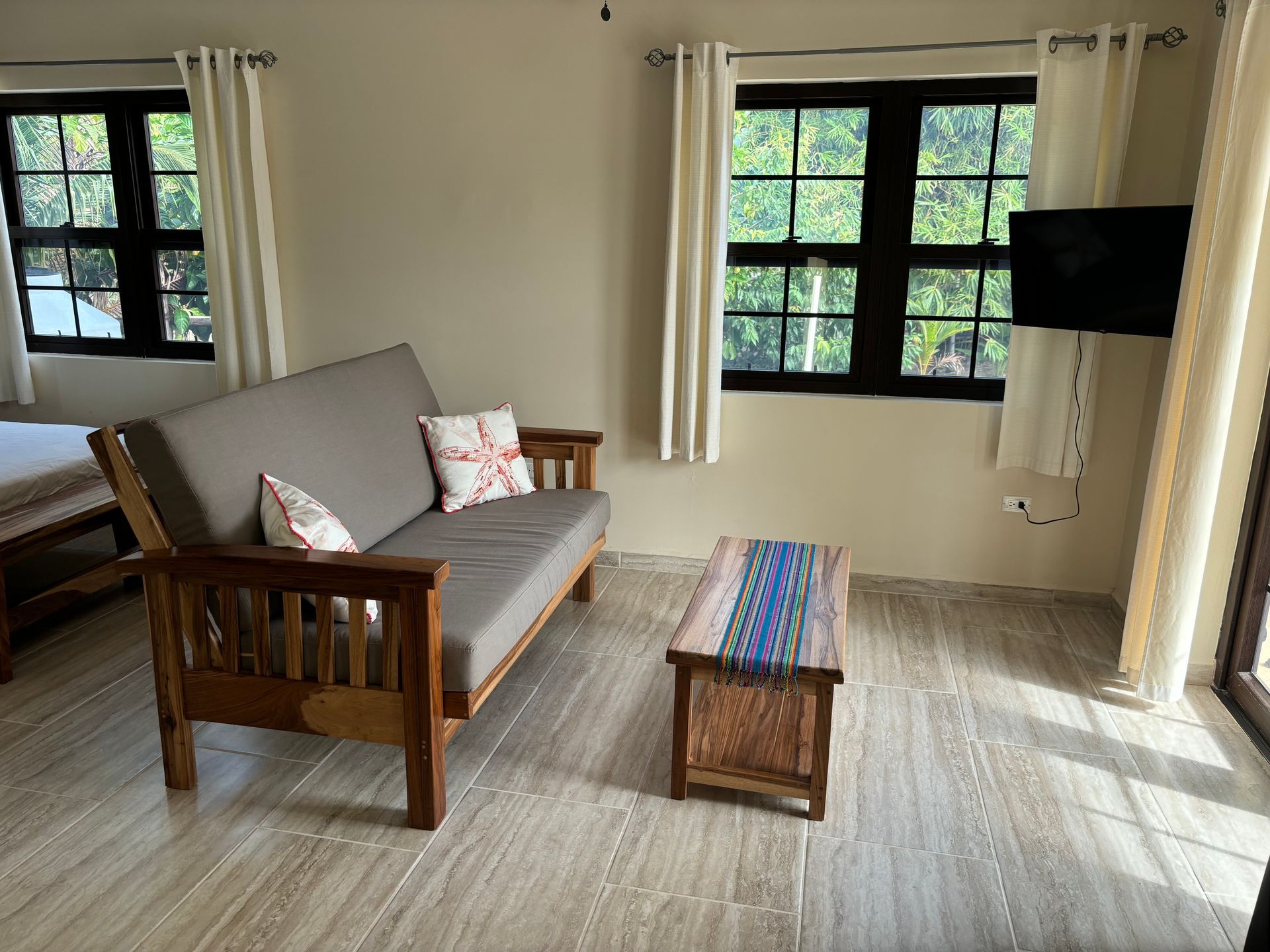 Toucan Suite couch and a coffee table in the living room.