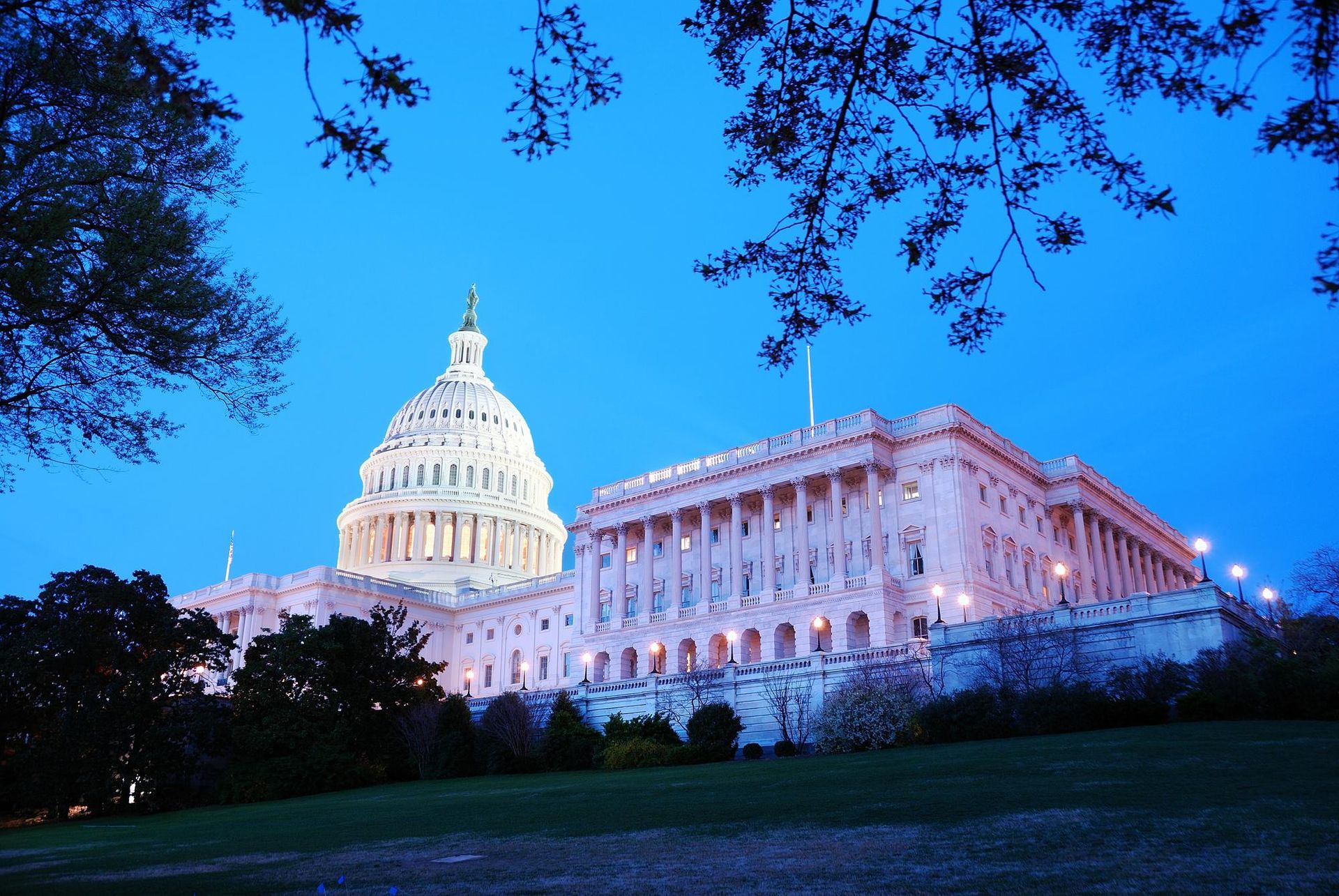 The capitol building is lit up at night