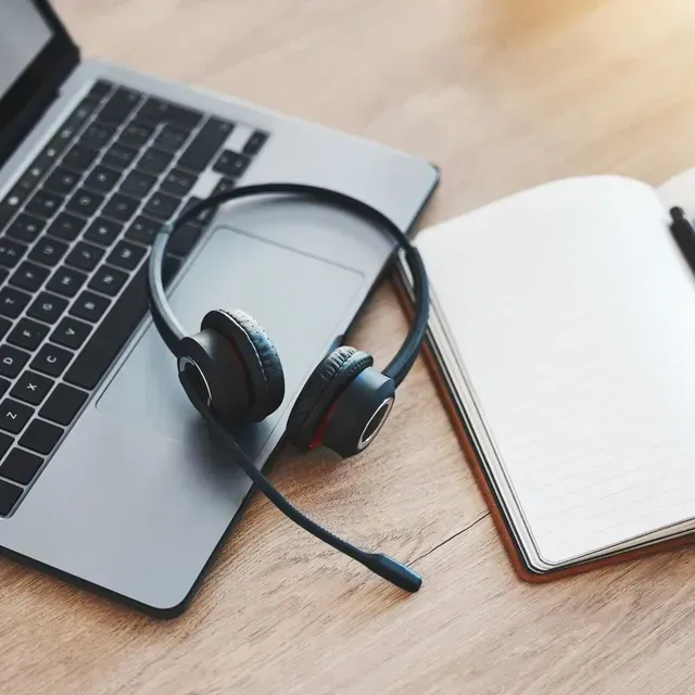 Laptop and a headset with notebook
