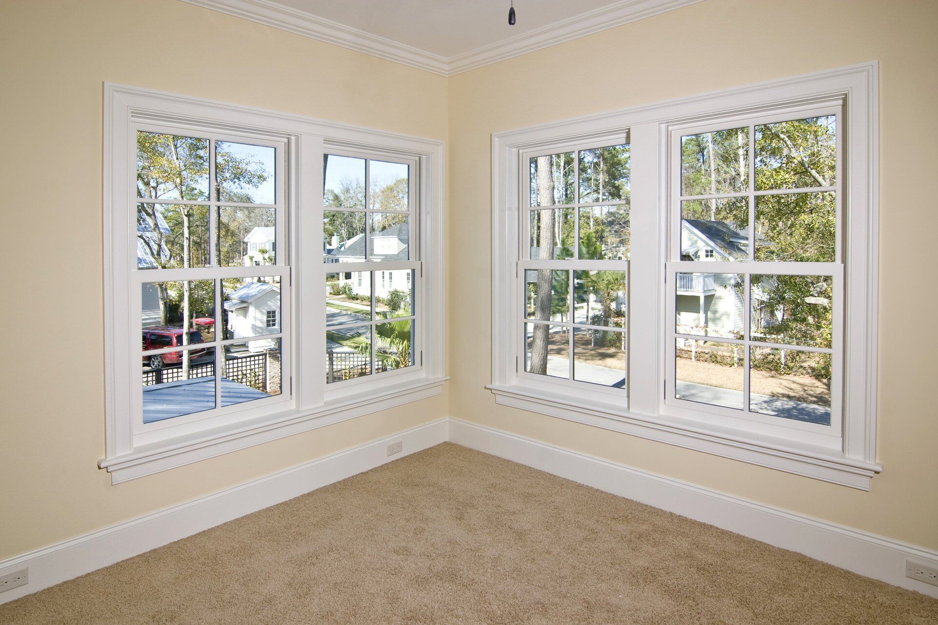 Andersen white wood window in a newly constructed apartment.