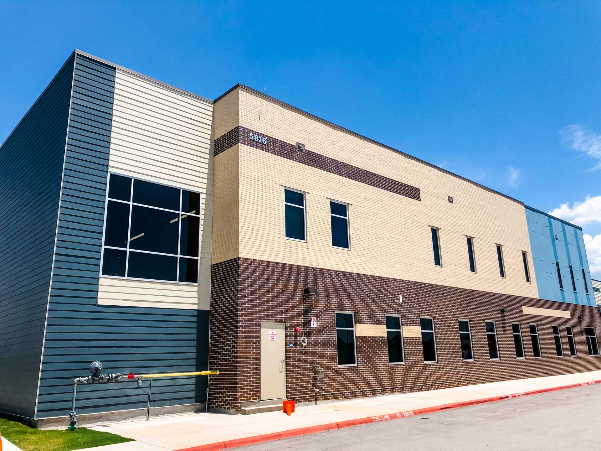 Commercial James Hardie Fiber Cement Siding installed on a school in Georgetown, Texas.