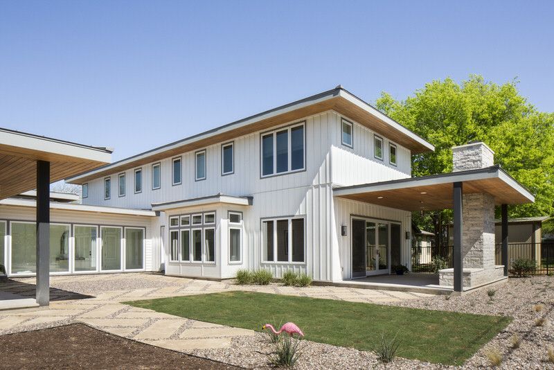 The James Hardie fiber cement siding on this Austin, Texan home done, in white with gray trim.