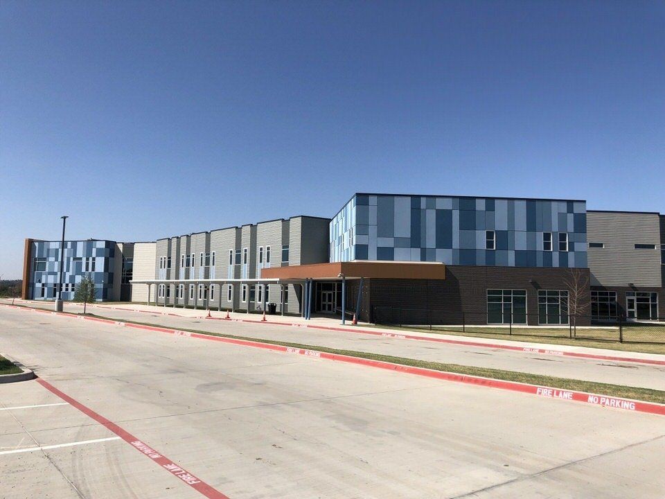 Charter school commercial siding contractor completed project in Austin, Texas.