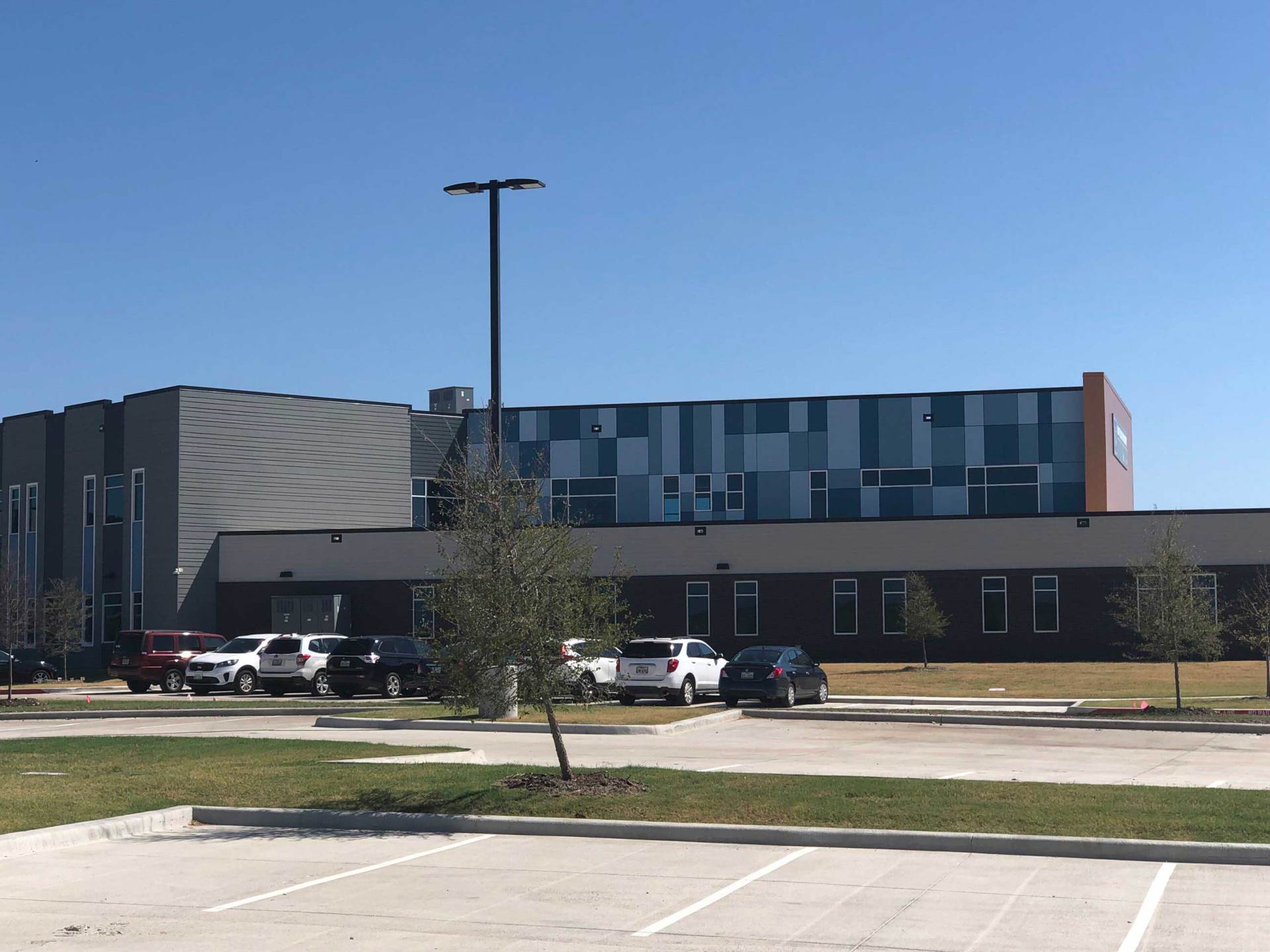 James Hardie Reveal System on a rainscreenand James Hardie lap siding, for a school in Ft Worth, Texas.