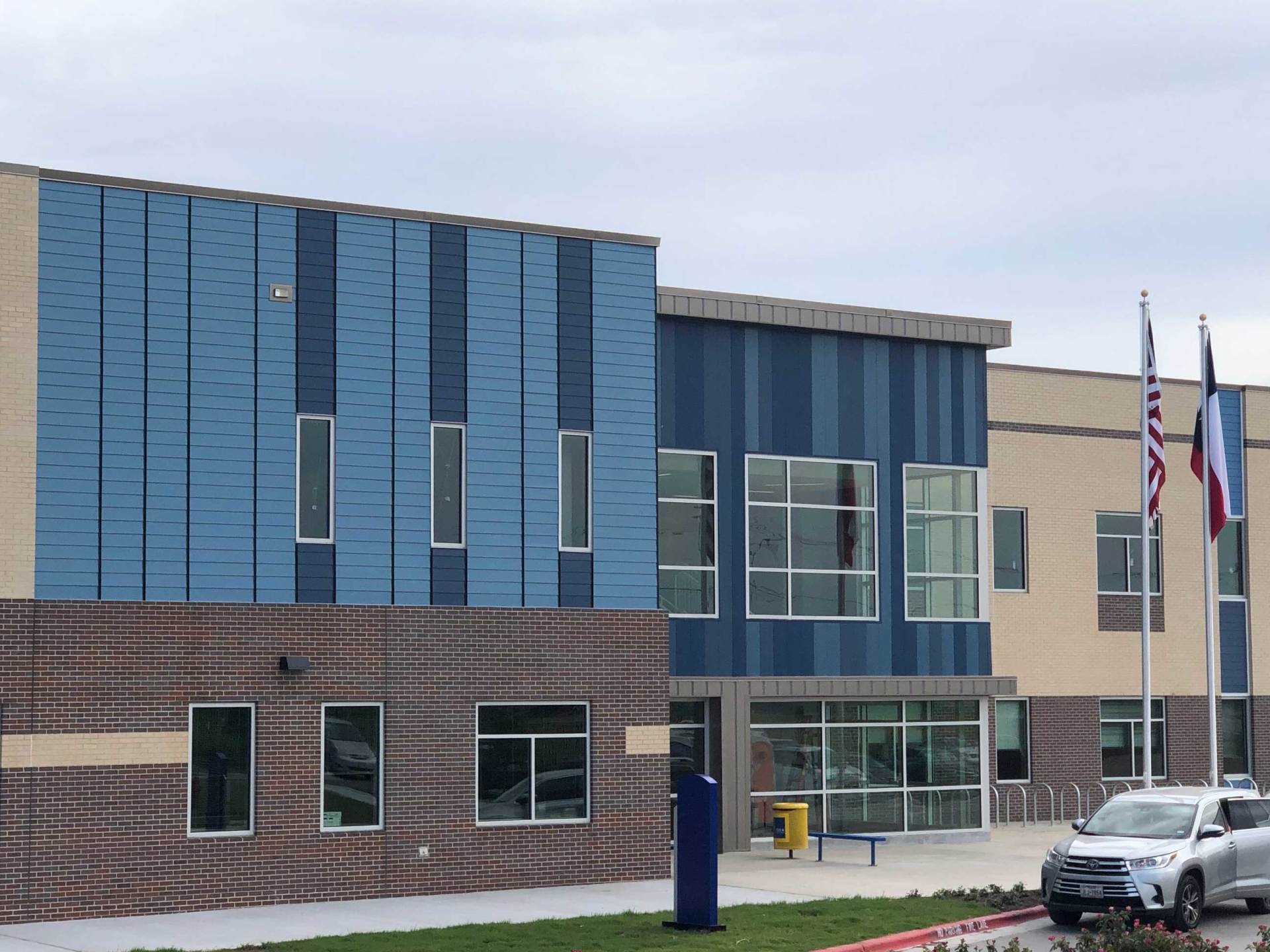 James Hardie ColorPlus and Primed Siding, EZ Trim Aluminum Reveals and Trims on a school in Georgetown, Texas.