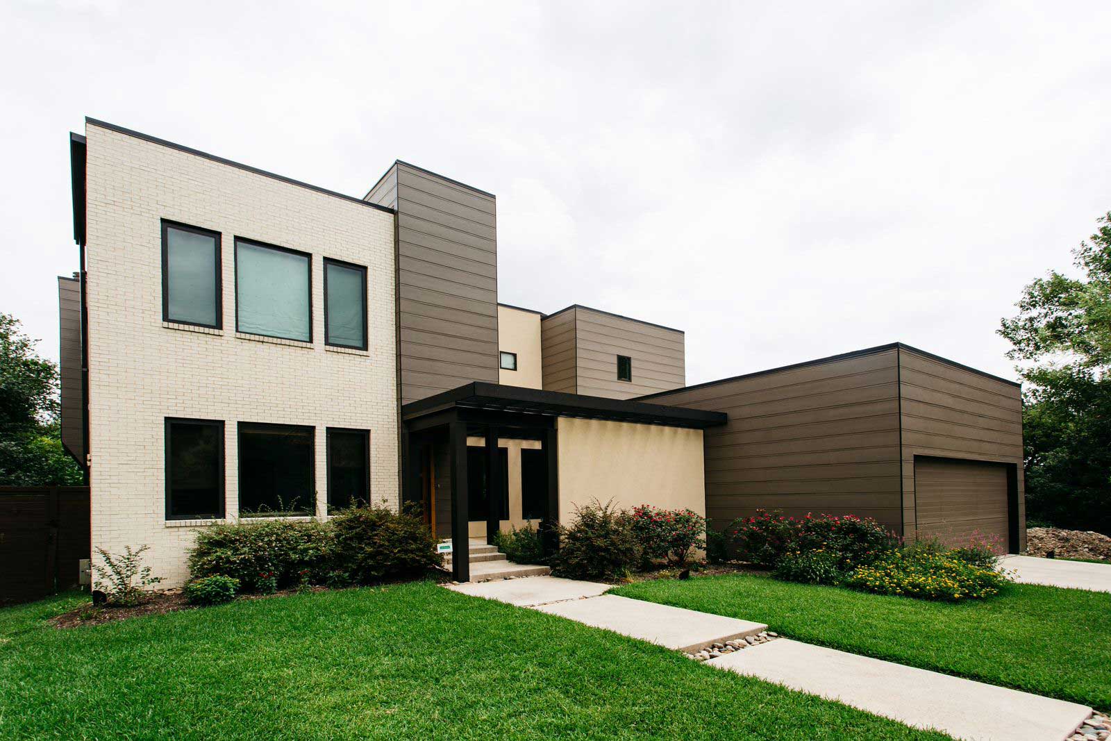 Modern Fort Worth, Texas home with brick and James Hardie fiber cement siding.