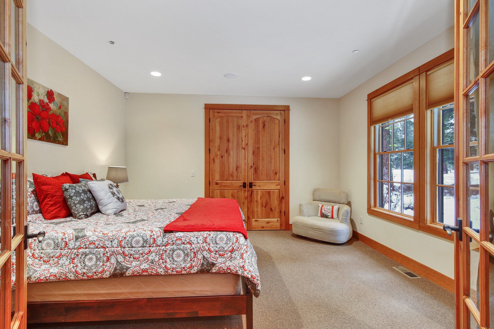 Wood windows installed in a bedroom.