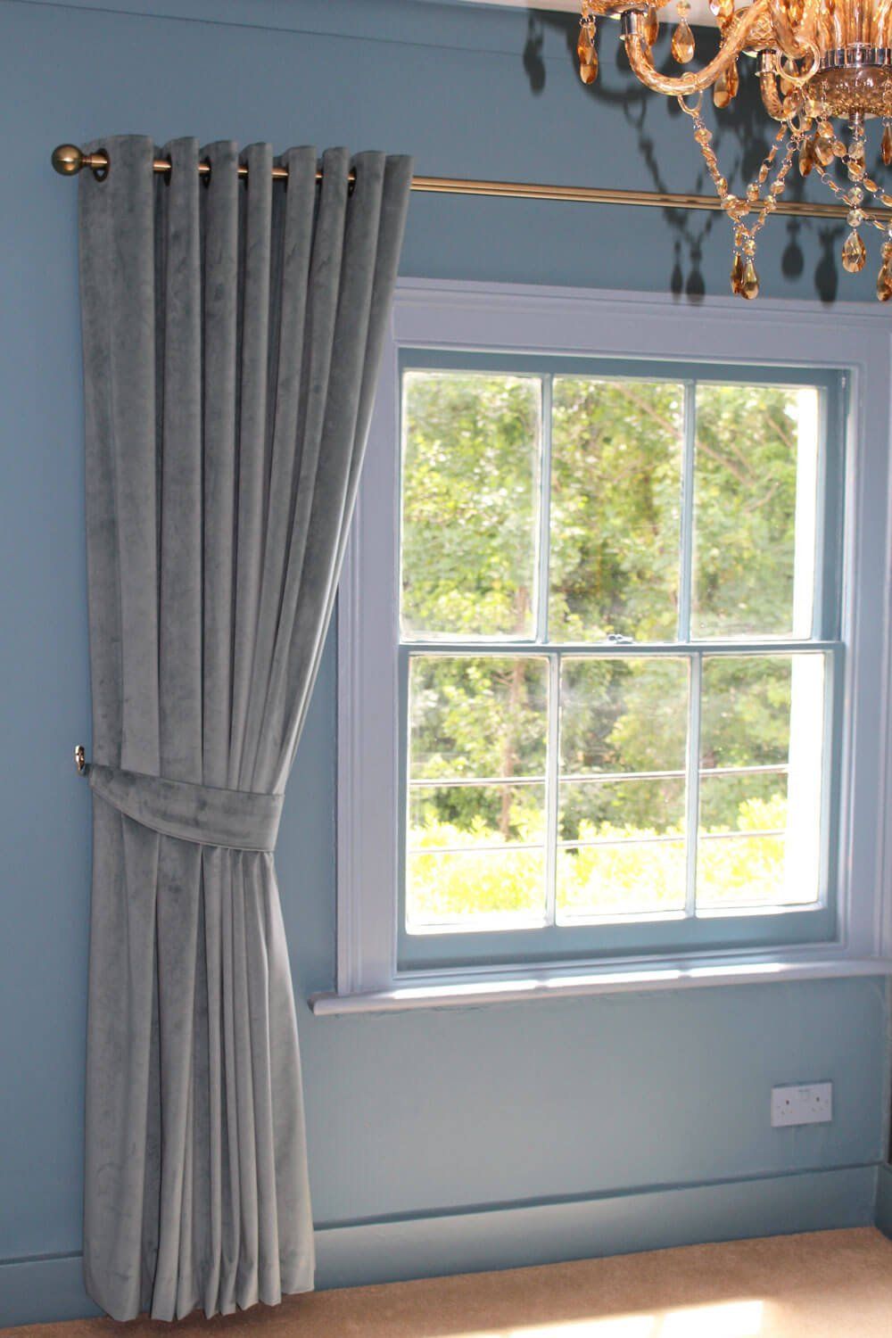 gray cartoons at a window