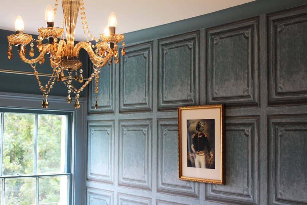 wooden wall with a painting on