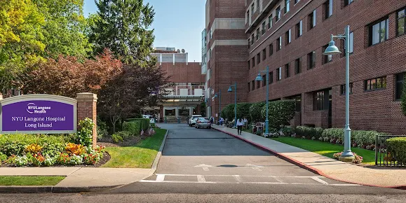 Entrance to a hospital, brick building, sign with 