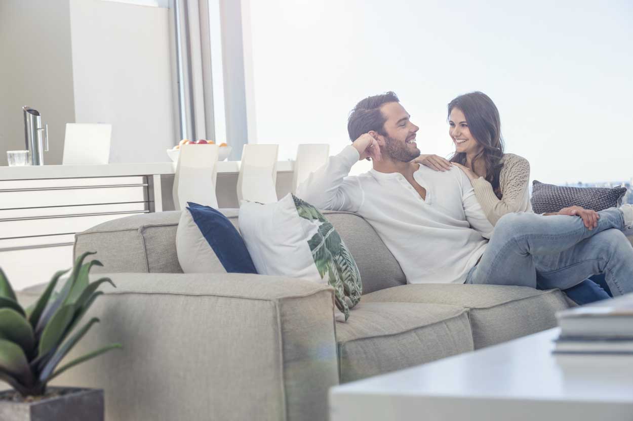 Couple relaxing on couch