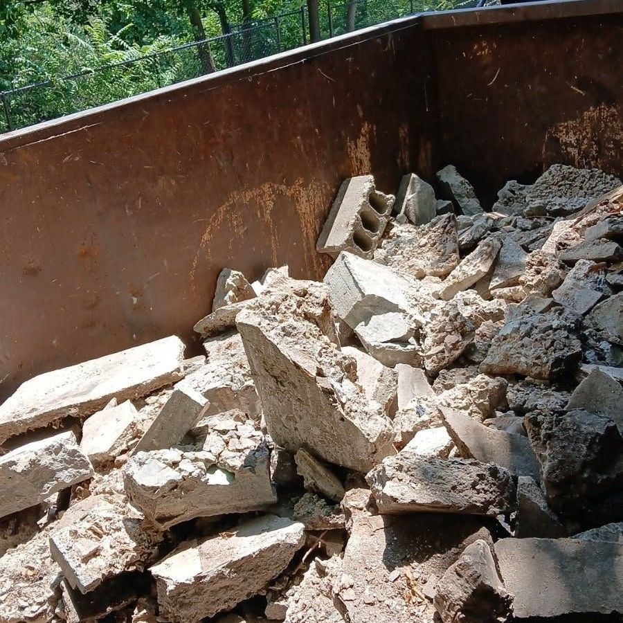 Professional demolition crew performing controlled interior tear-out in Boston