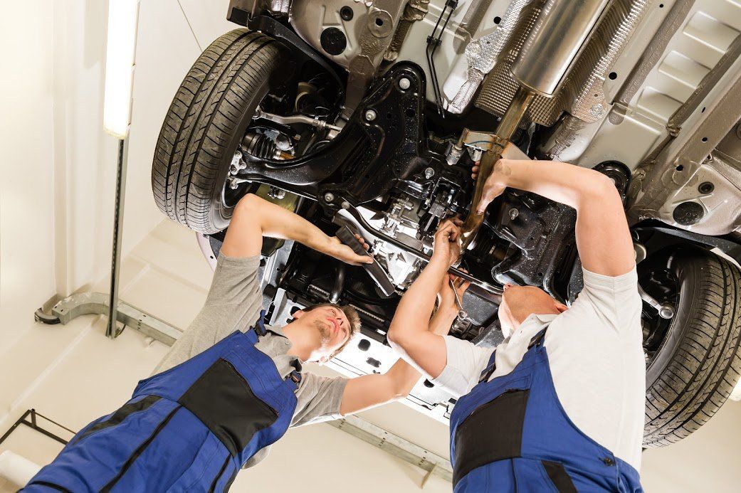 Automotive CV Joints — Mechanics Checking CV Joints in Sacramento, CA