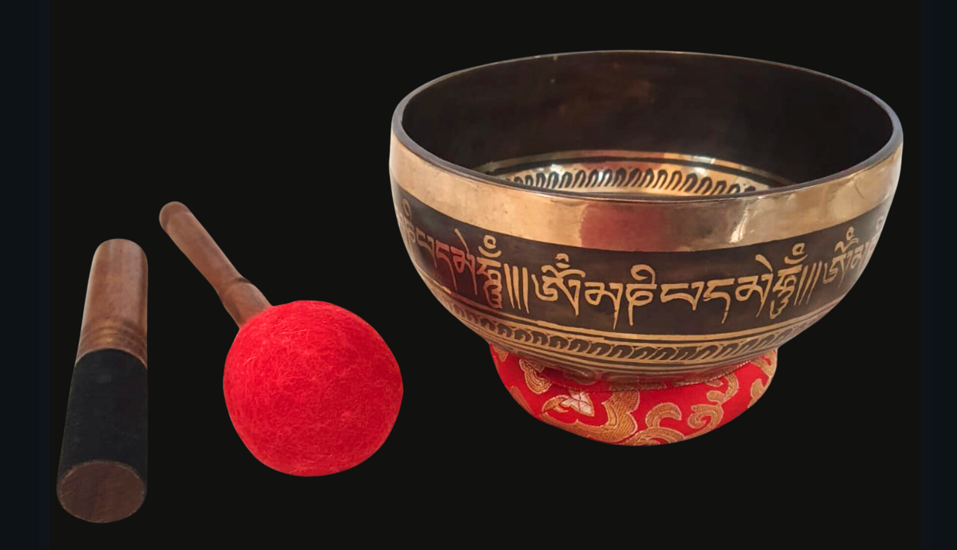 Handmade 7-metal singing bowl from Nepal with chakra symbols engraved, representing energy centers from root to crown.