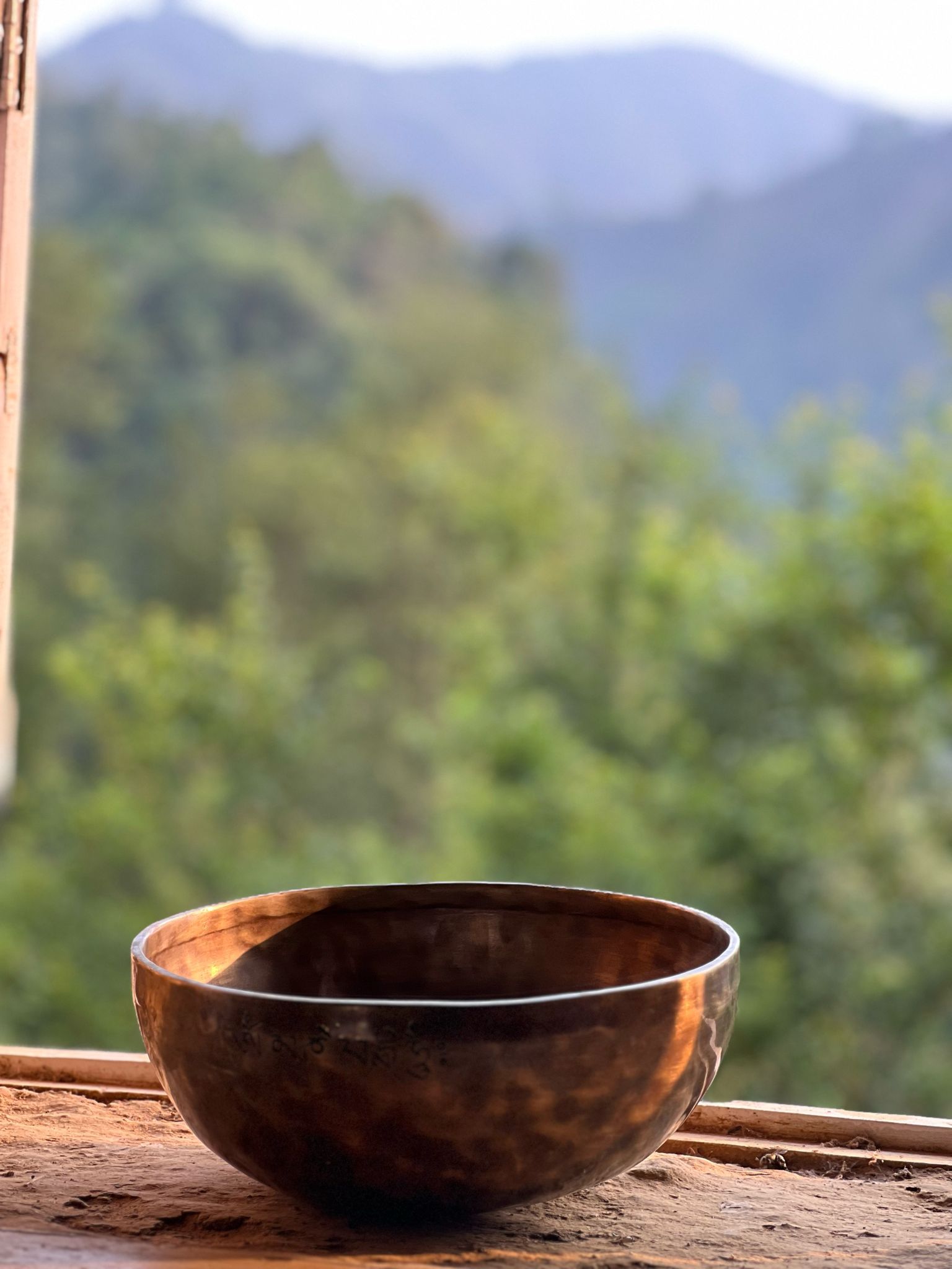 AI-generated image of Shiva and Shakti with a Tibetan 7 metal hand-made singing bowl made in Nepal, radiating divine union.