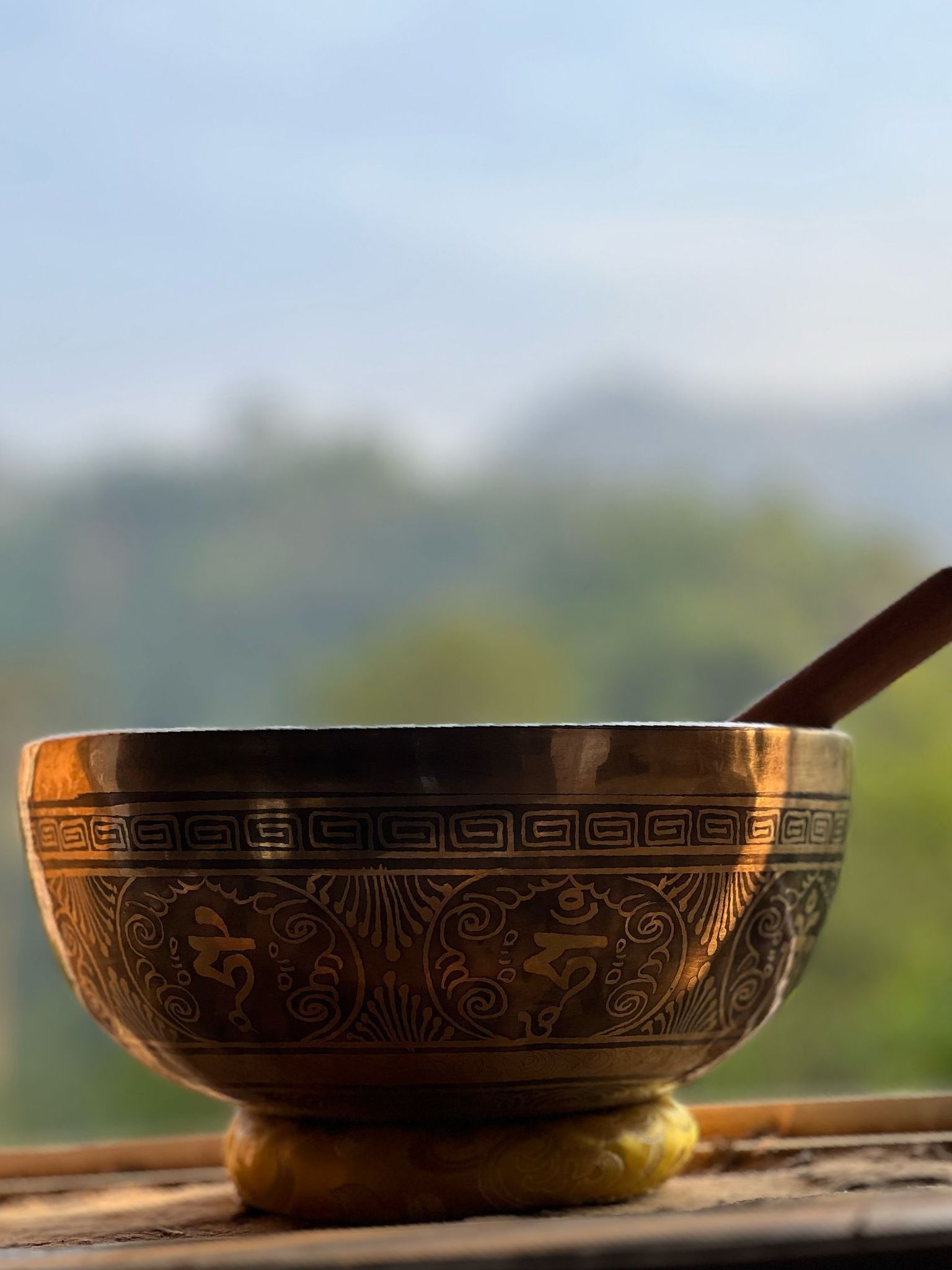 AI-generated image of Shiva and Shakti with a Tibetan 7 metal hand-made singing bowl made in Nepal, radiating divine union.
