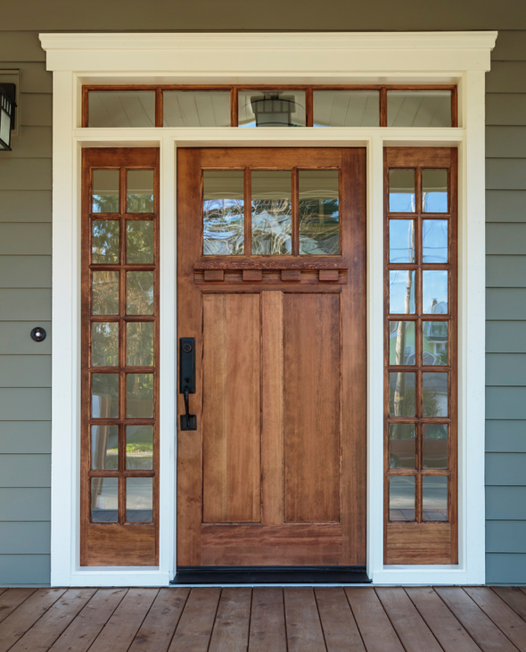 This is a picture of a replacement front door.  The front door is wood with glass side panels.