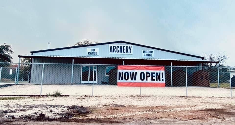 A gray metal building with an 