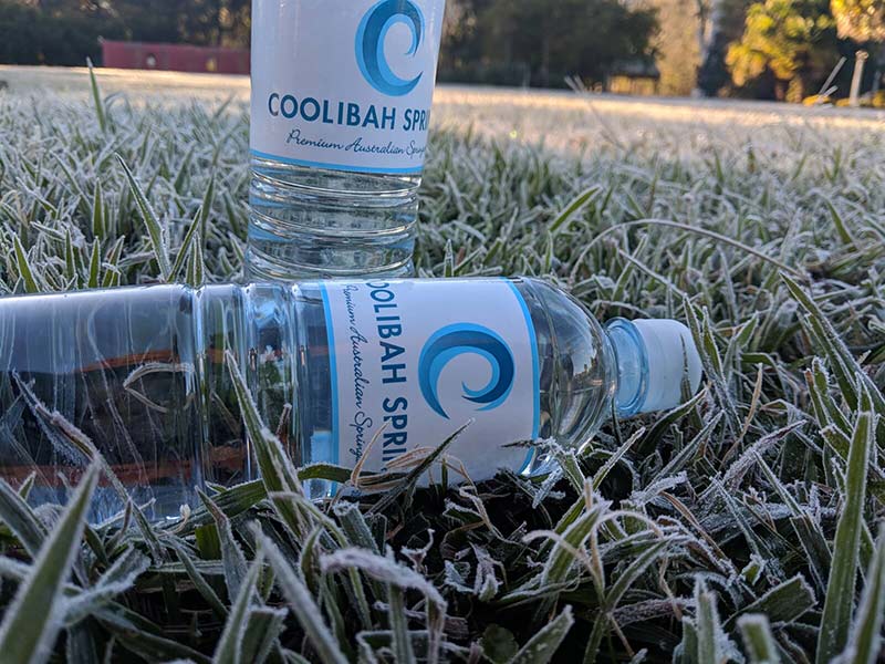 Bottled Water in Grass — Bottled Water in Canungra, QLD