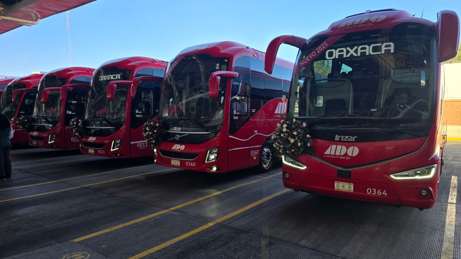 ADO buses are at the station.