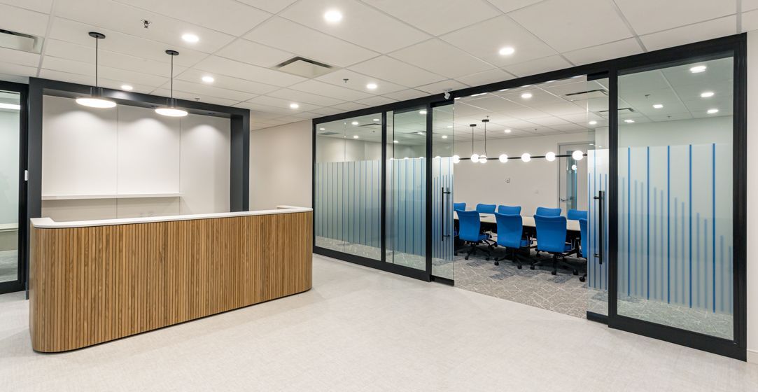 There is a reception desk in the middle of the room.