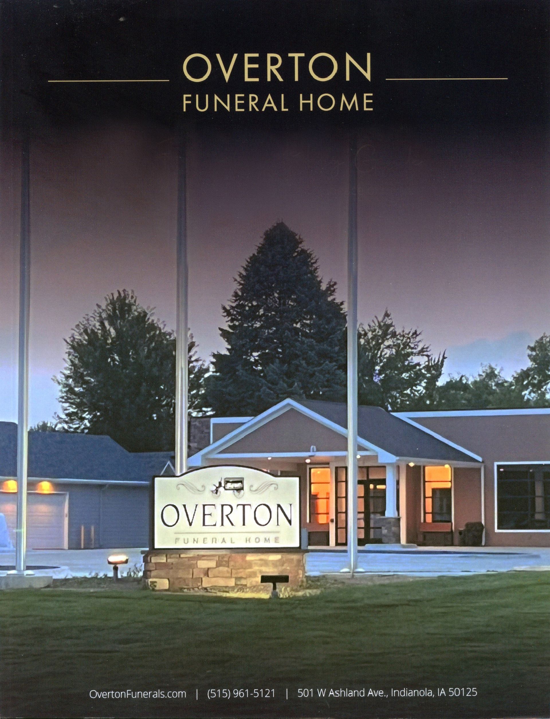 Overton Funeral Home building exterior with sign at dusk.