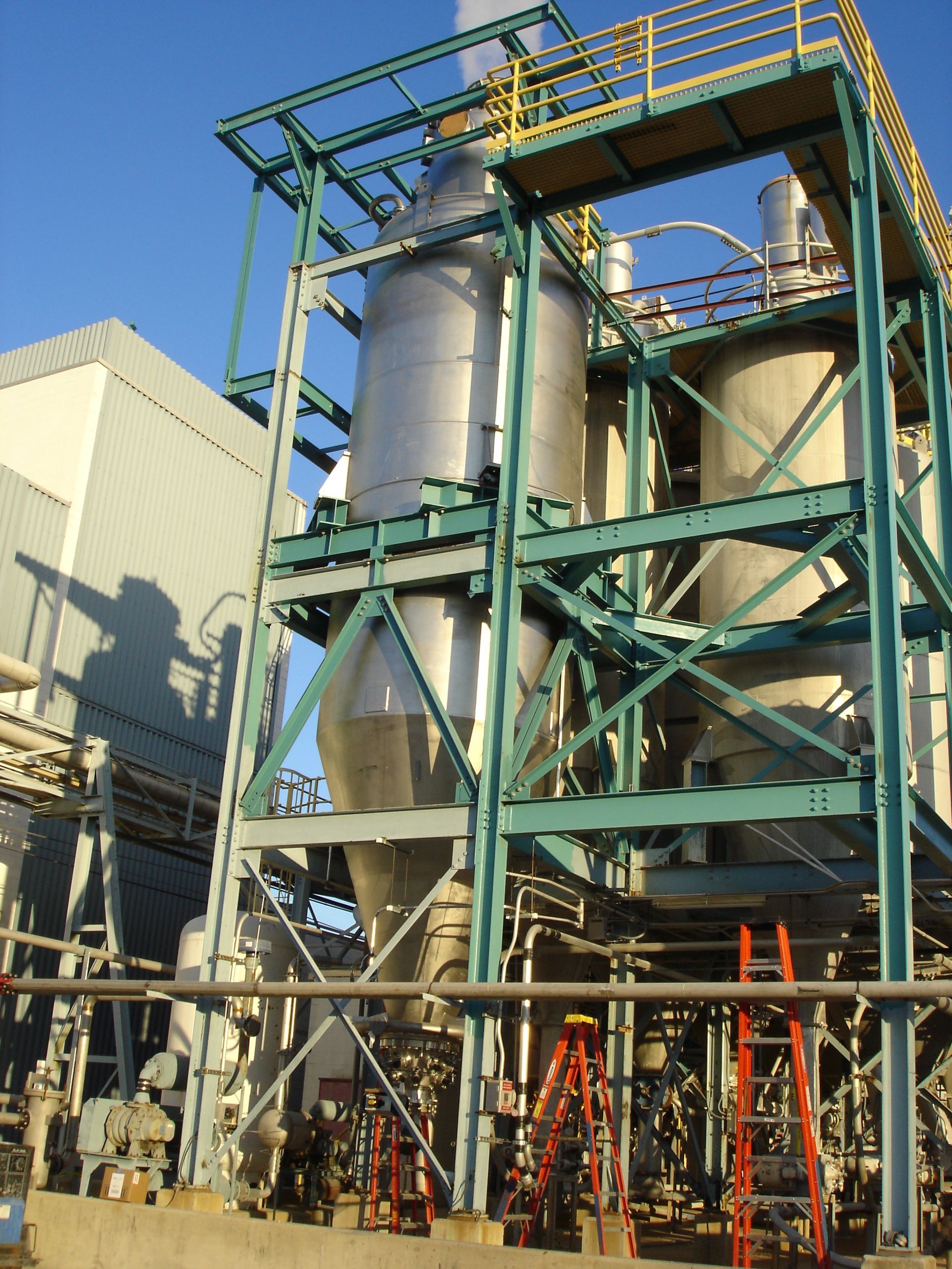 A large building under construction with a lot of steel beams