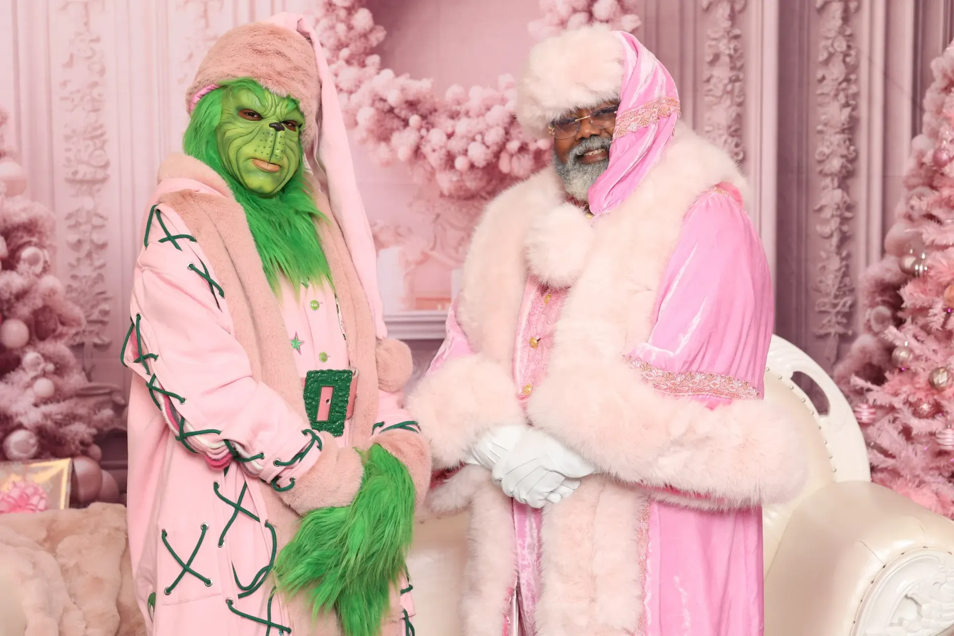 Pink Grinch with child posing