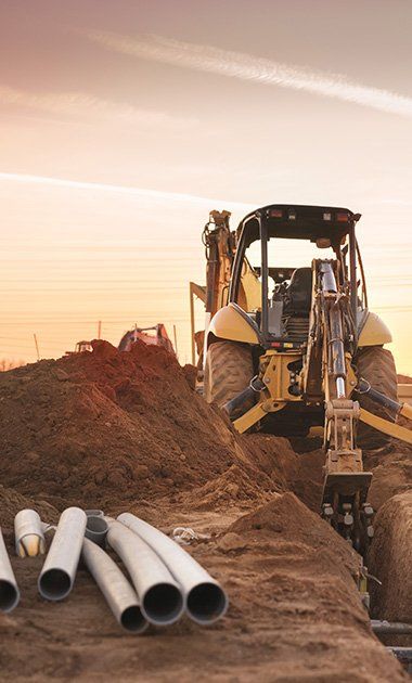 Underground Utilities — Excavator Truck in Fort Walton Beach, FL Underground Utilities — Excavator Truck in Fort Walton Beach, FL
