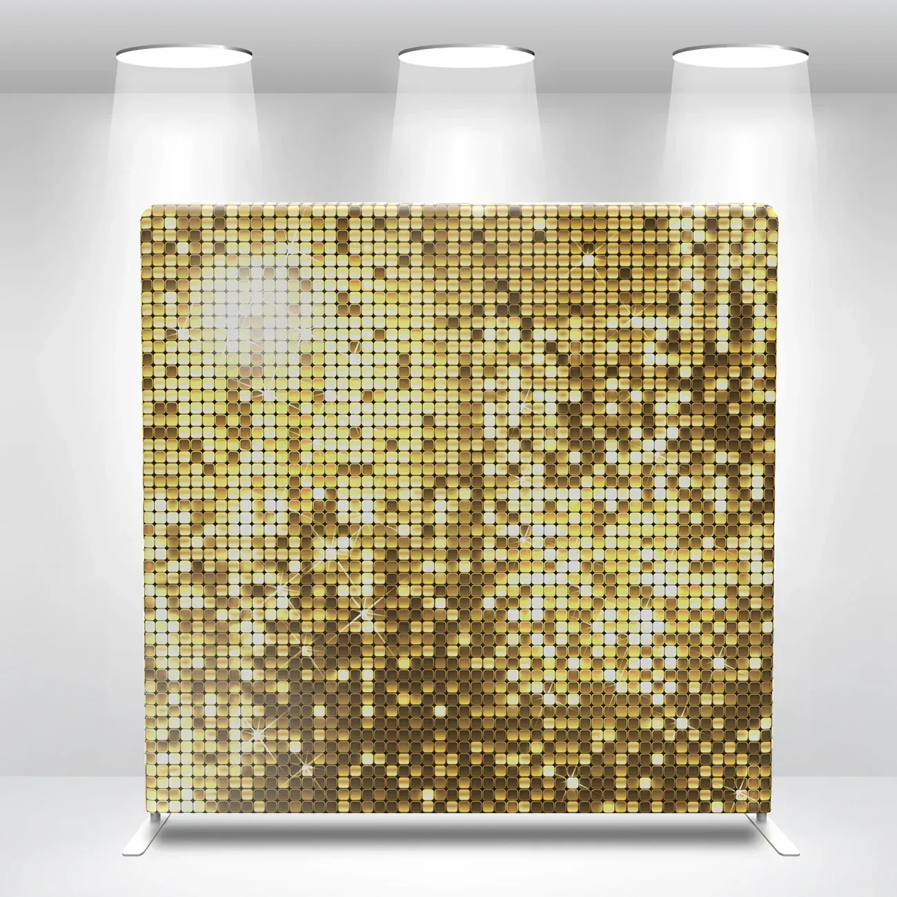 A gold sequined backdrop is sitting in a room with three lights.