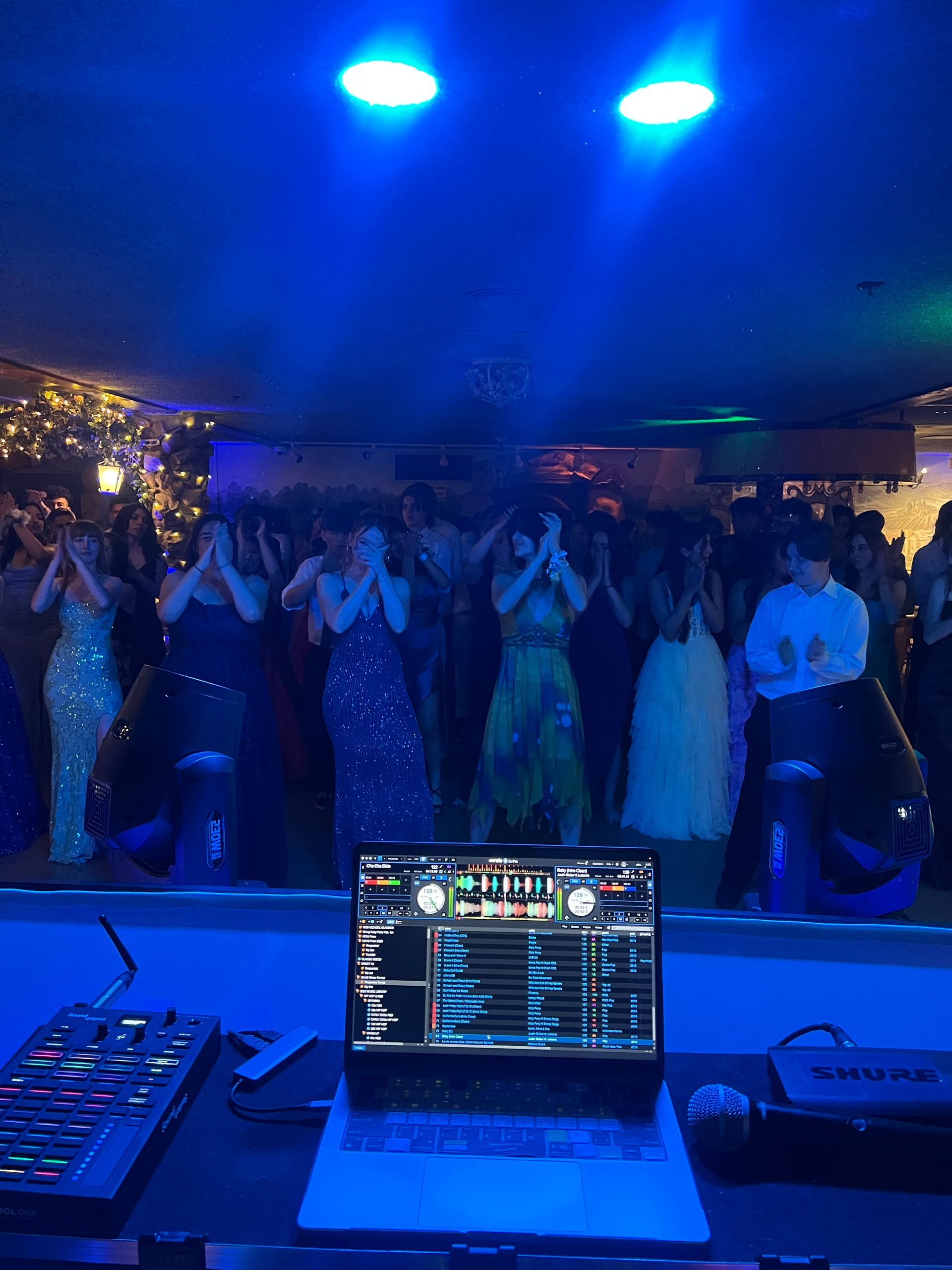 Guests dancing to DJ in San Luis Obispo, CA at a High School Prom.