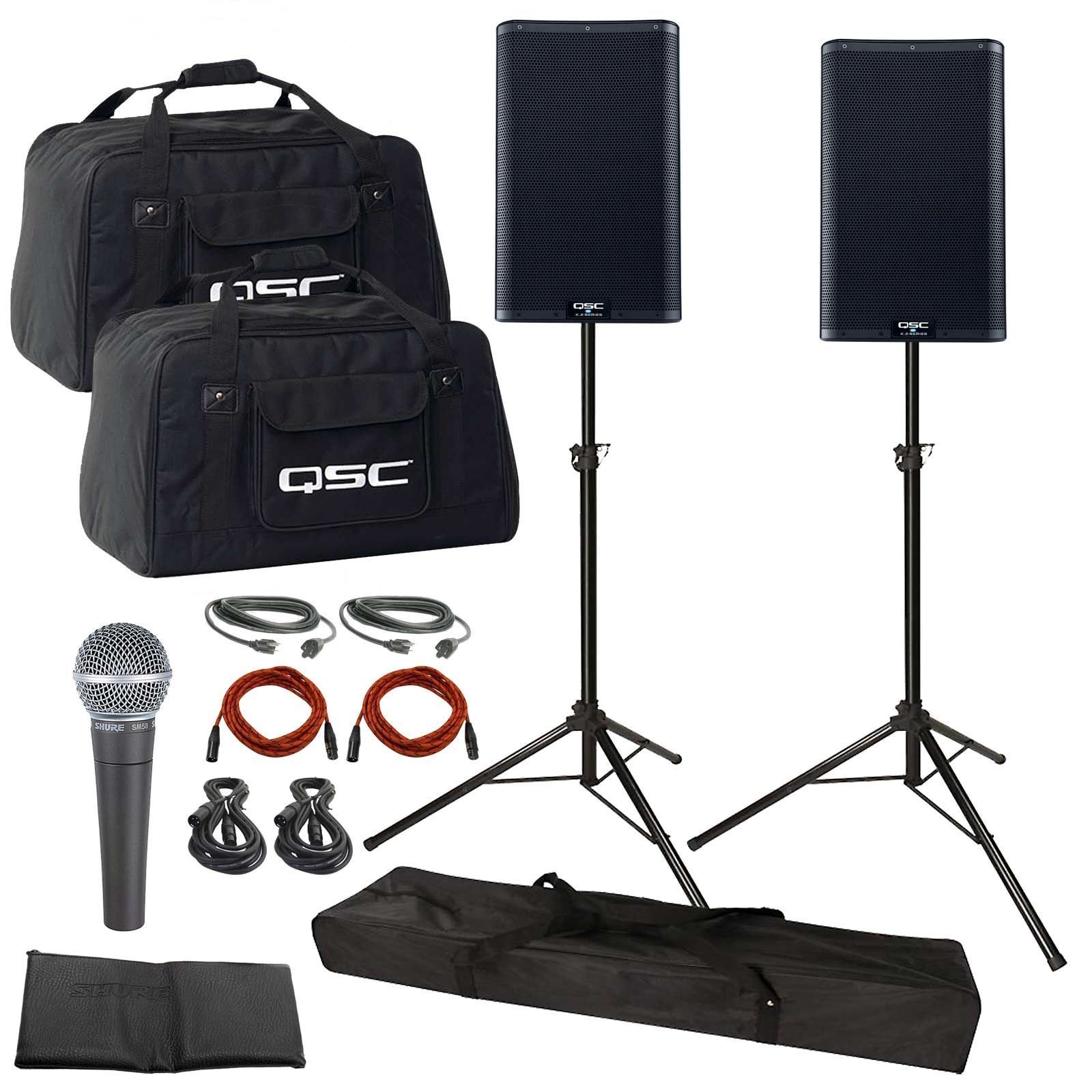 A set of speakers , microphones , cables and bags