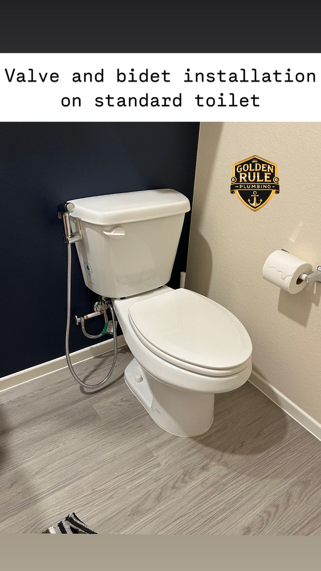 A toilet with a bidet attached to it in a bathroom.