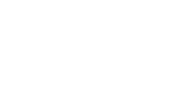 A classic, clear glass carafe filled with water, positioned centrally against a solid, neutral beige background.