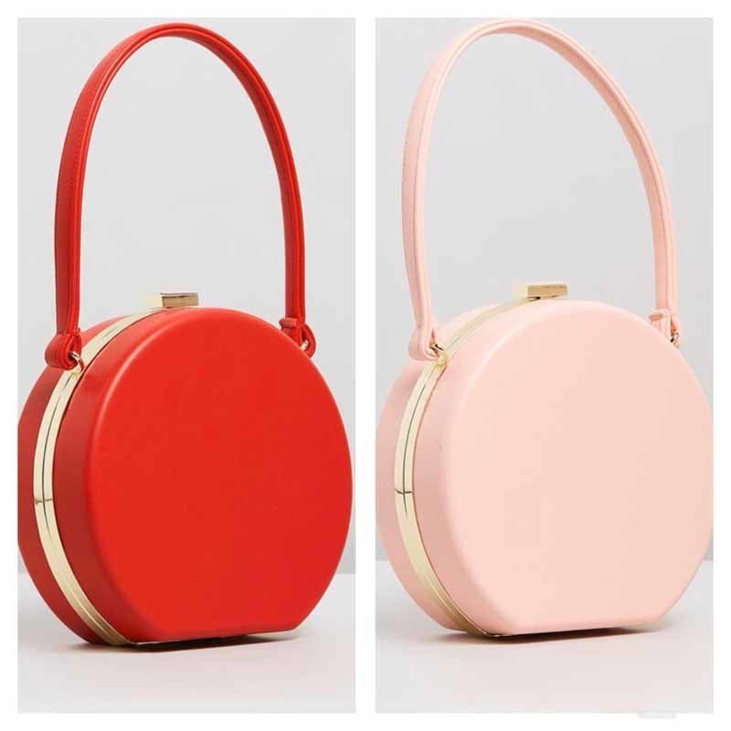 red and pink hand bags with zippers