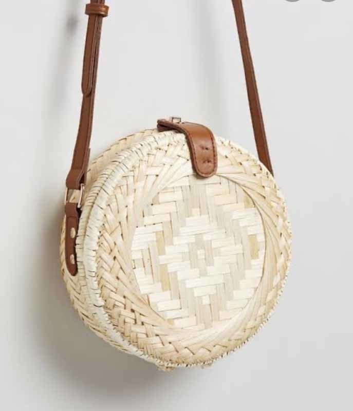 circular handbag with diamond pattern
